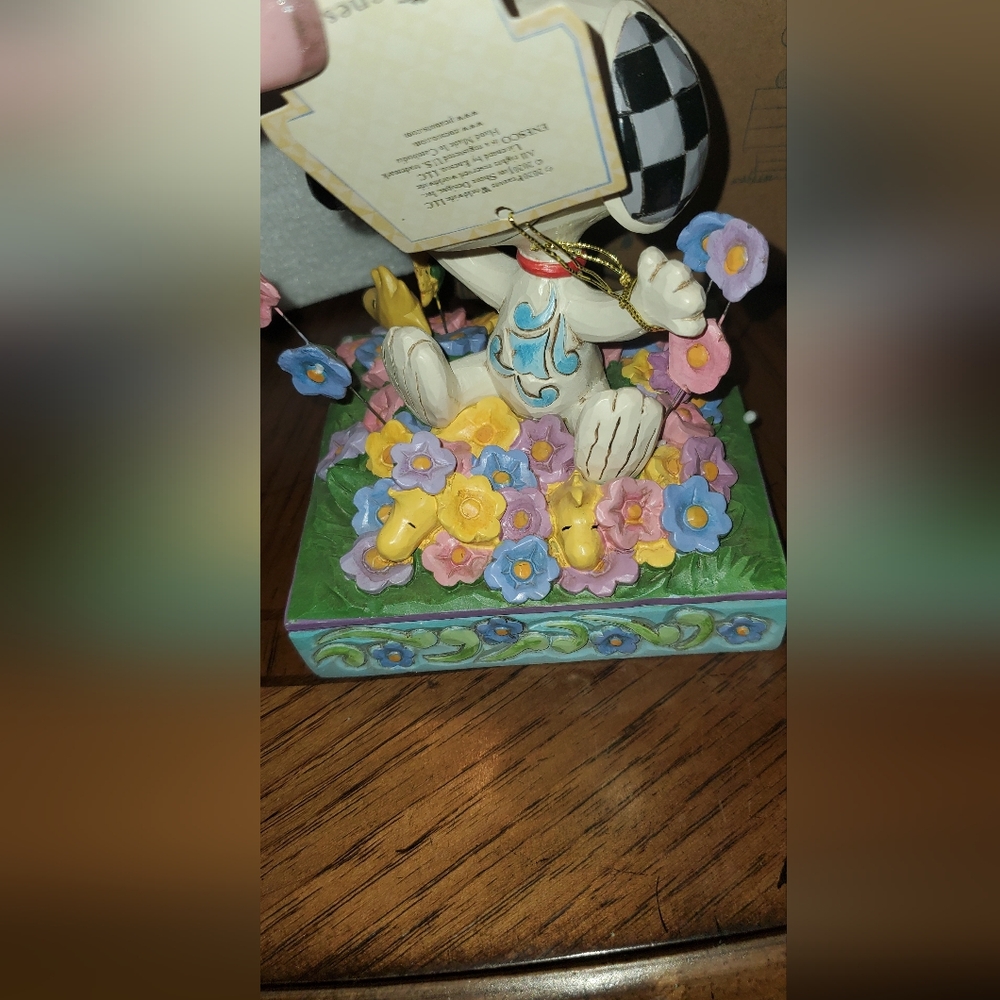 Peanuts Jim Shore Spring Figurine with Yellow and Pink Accents